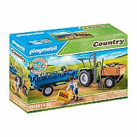 PM HARVESTER TRACTOR W TRAILER